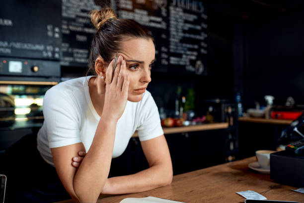 A customer looking confused outside a restaurant with many options but none standing out.